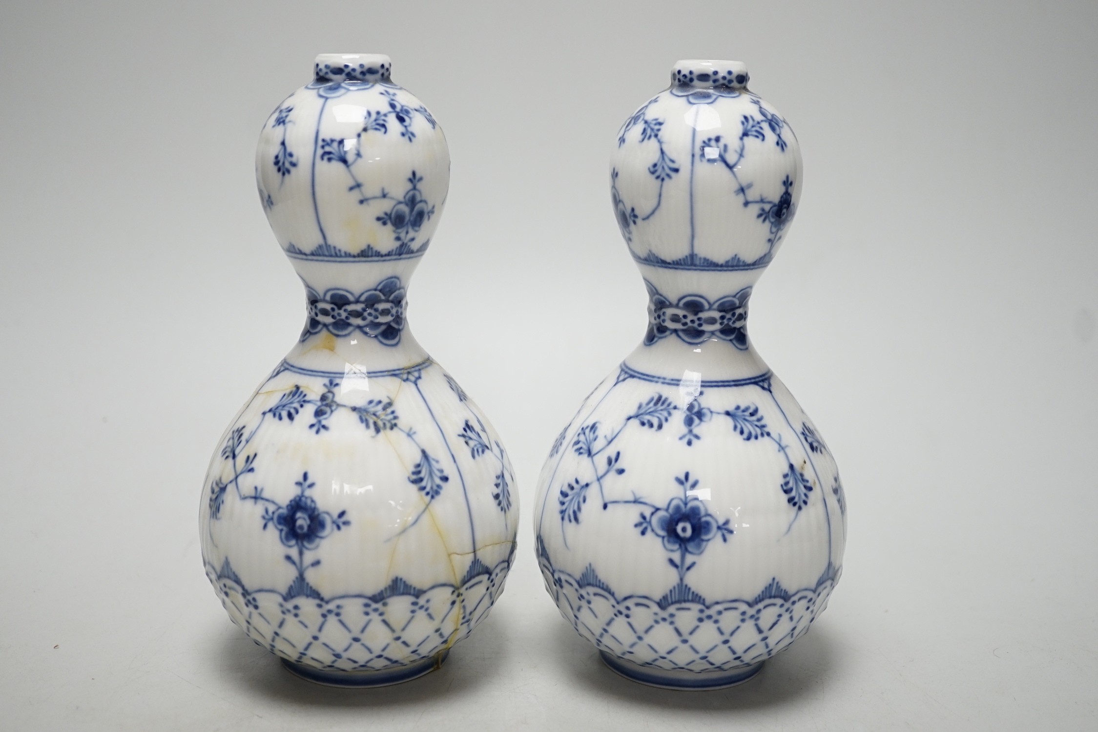 A pair of Royal Copenhagen onion pattern vases, 17cm